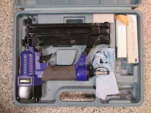 lot 729 image: Central Pneumatic Electric Nail Gun...