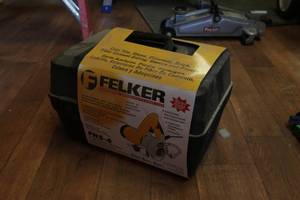 lot 342 image: Felker tile saw  (brand new)...