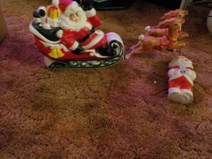 lot 83 image: Vintage Santa in Sled and Squeaky S...
