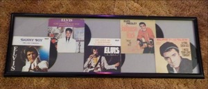 lot 115 image: 5 of Elvis 45s Records in framed  P...