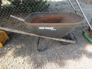 lot 99 image: Wheelbarrow & (2) Lawn Mowers