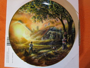 lot 48 image: (3) Terry Redlin Limited Edition Plates