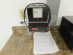 lot 402 image: Time Clock and Tops Weekly Time Cards