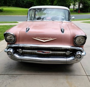 lot 1 image: Pink 1957 Chevy Bel Air