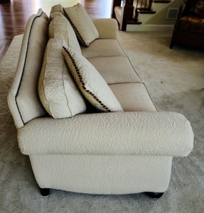 lot 3 image: Cream Textured Ethan Allen Sofa