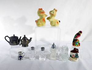 lot 97 image: Lot of Salt and Pepper Shakers including Bunny Hug by van Tellingin and Godinger teapots