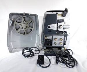 lot 79 image: Vintage Sears Tower Remote Control 8mm Projector
