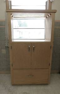 lot 109 image: Vintage Rolling Wood Cabinet