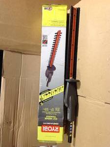 lot 9 image: Expand-It 17-12 in. Universal Hedge Trimmer Attachment in good condition