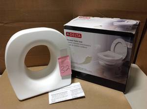 lot 32 image: Elevated Toilet Seat in White in good condition