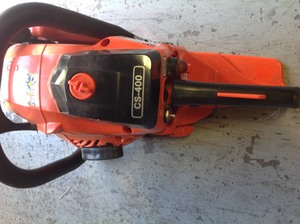 lot 104 image: ECHO 18 in. 40.2 cc Gas 2-Stroke Cycle Chainsaw in working conditions