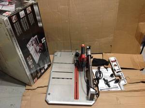 lot 14 image: Skil 7.0 Amp 4-38 in. Corded Flooring Saw