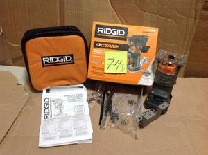 lot 74 image: RIDGID 18-Volt OCTANE Cordless Brushless Compact Fixed Base Router with 14 in. Bit, Round and Square Bases