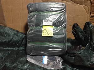 lot 86 image: COLOURTREE 6 ft. x 50 ft. Green Privacy Fence Screen Mesh Fabric Cover Windscreen with Reinforced Grommets for Garden Fence