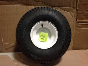 lot 98 image: Arnold 20 in. x 8 in. Rear Tractor Wheel for John Deere, Ariens, Husquvarna and Poulan Pro Lawn and Garden Tractors