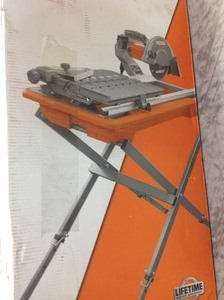 lot 111 image: RIDGID 9 Amp Corded 7 in. Wet Tile Saw with Stand in good conditions