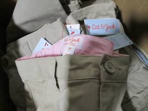 15 Tan cat and jack uniform pants...