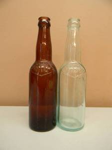 lot 10 image: ANTIQUE PRE PROHIBITION GRAIN BELT BEER GLASS BOTTLES - 1 CLEAR 1 DARK - MARKED GOLDEN GRAIN BELT BEERS - BOTH NICE - SEE PICTURES