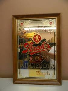 lot 30 image: VINTAGE WE PROUDLY SERVE STROHS BEER TO OUR MINNESOTA FRIENDS BAR MIRROR SIGN - GREAT FOR THE CAVE - NICE - APPROX 15 BY 22 - SEE PICTURES