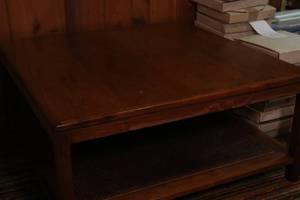 Coffee table with wicker bottom she...