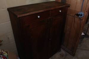 Antique wood cabinet and contents