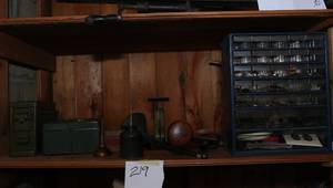 Organizer full of hardware, oil can...