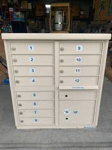 lot 98 image: 12 Door Cluster Mailbox by AF Florence with Keys ($1419.00 retail)