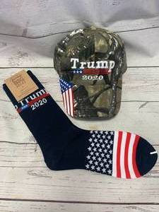 lot 113 image: New Trump Camo Hat & Socks