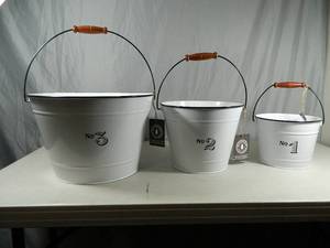 lot 32 image: 3 New Metal Planters with Drain Plugs