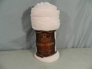 lot 87 image: New Pink Throw