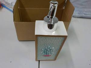 lot 39 image: Decorative Fish and Coral Lotion Di...