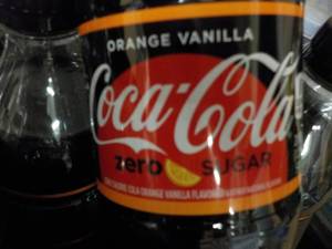 lot 203 image: Case of 24 Bottles Orange Vanilla C...