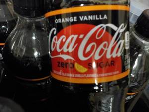 lot 204 image: Case of 24 Bottles Orange Vanilla C...