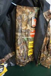 lot 218 image: Scent Blocker Plus Ultralite 2 PC Hooded Jacket & Pant Set In Hardwoods Camo