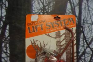 lot 318 image: Big Game Tree Stands Big Game Lift Processing System