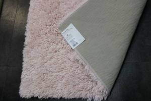 lot 104 image: Room Essentials Light Pink Shag Accent Rug