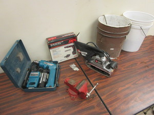 lot 533 image: MAKITA CORDLESS DRIVER DRILL, SKIL CORDLESS DRILL DRIVER, PORTER-CABLE BELT SANDER, 3 12 VISE, NAILS