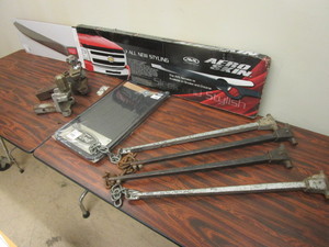 lot 534 image: FORD MUDFLAPS - NEW, CHEVY EQUINOX AERO SKIN AUTO VENT SHADE, TRAILER HITCHES, MORE