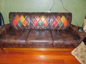 lot 81 image: Leather Couch with Decorative Back