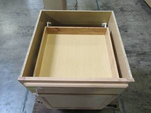 lot 106 image: Hampton Bay Assembled 24x34.5x24 in. Base Kitchen Cabinet in Unfinished Beech KB24-UFDF