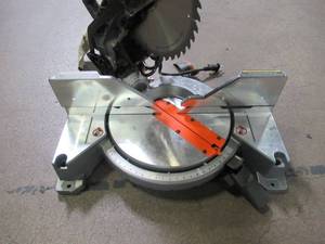 lot 32 image: RIDGID 15 Amp 10 in. Dual Bevel Miter Saw R4112