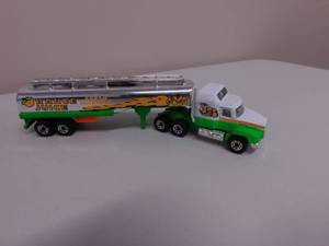lot 80 image: 2 - Collectible Trucks & Tank Car