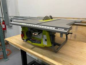 lot 15 image: RYOBI RTS12T  15 Amp 10 in. Table Saw