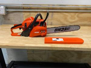 lot 23 image: ECHO 14 in. 30.5 cc Gas 2-Stroke Cycle Chainsaw