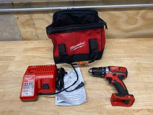 lot 39 image: MILWAUKEE  8-Volt Lithium-Ion Brushless Cordless Compact Drill with Charger and Bag