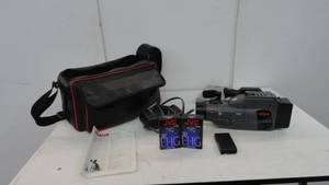 lot 3 image: RCA Video Camcorder With Bag, Book, Battery, Charger, & Tapes