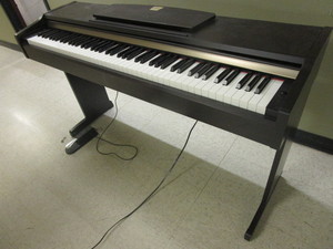 lot 718 image: YAMAHA CLAVINOVA ELECTRIC KEYBOARD