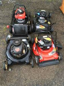LOT WITH 4 LAWN MOWERS FOR PARTS O REPAIRS CUSTOMER RETURNS SEE PICS