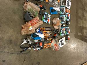 MIXED BIN FULL OF LAWN SUPPLIES CUSTOMER RETURNS SEE PICS