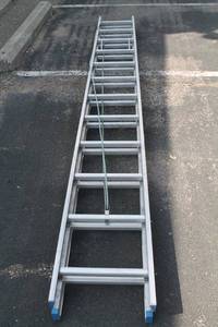 lot 31 image: 24 Ft Aluminum Ladder Werner Brand